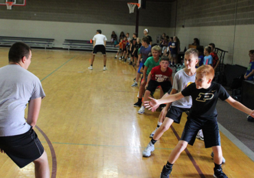 Basketball camp shuffle drills at summer camp in Michigan