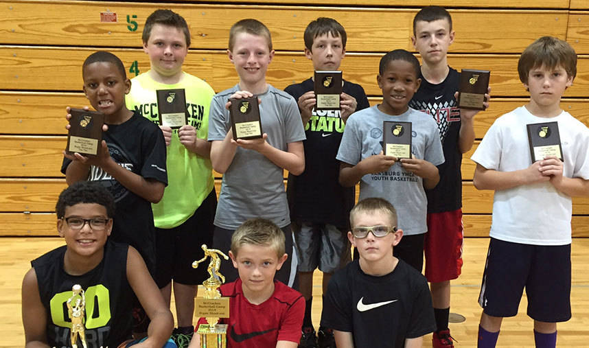 Campers with their trophies at the youth summer camp